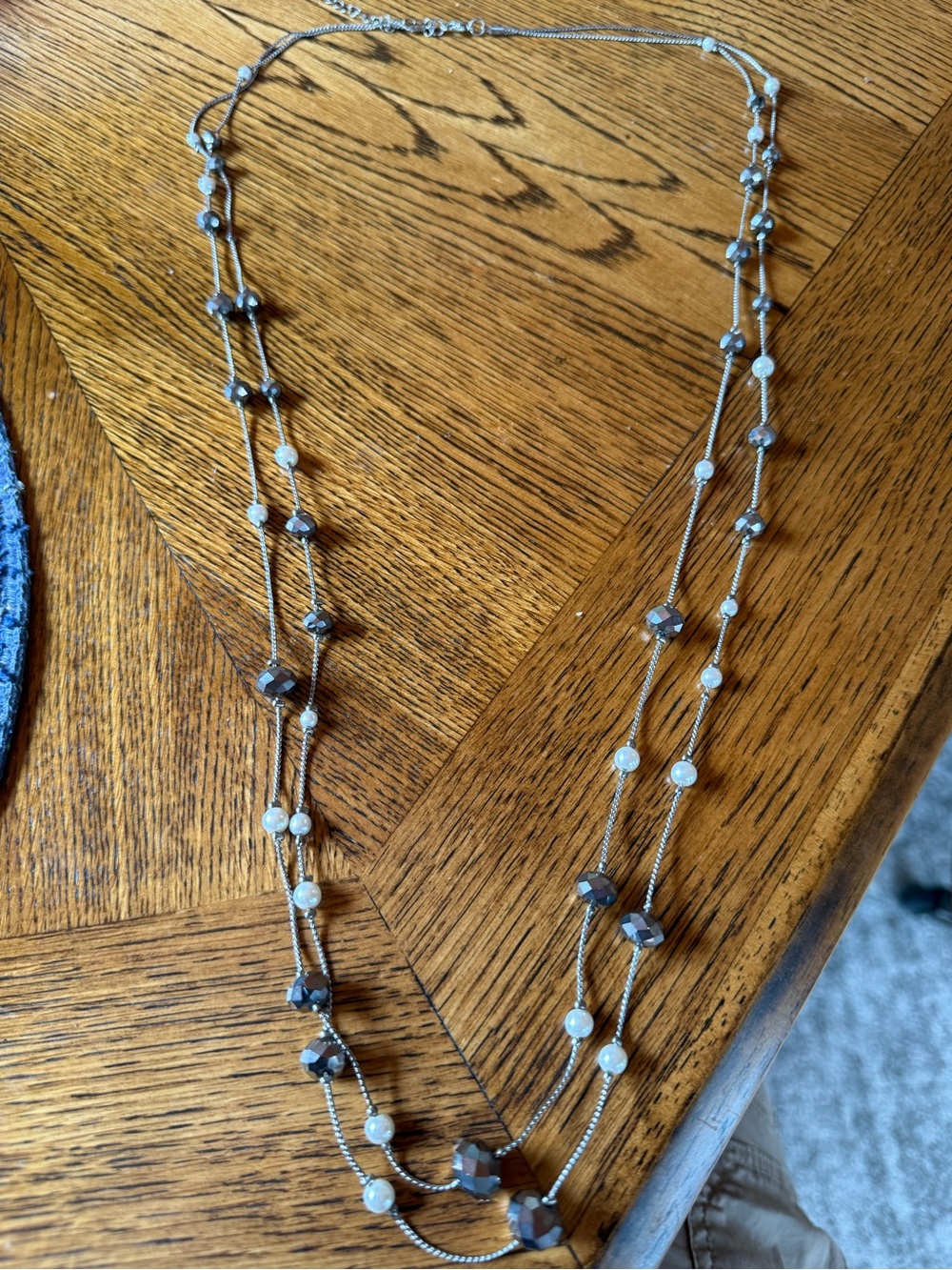 Silver Paparazzi necklace is a "Interstellar Illusions" a double strand design.